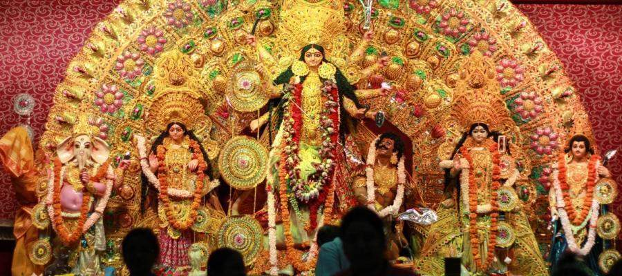 What are the spiritual and scientific significance of Durga Puja?