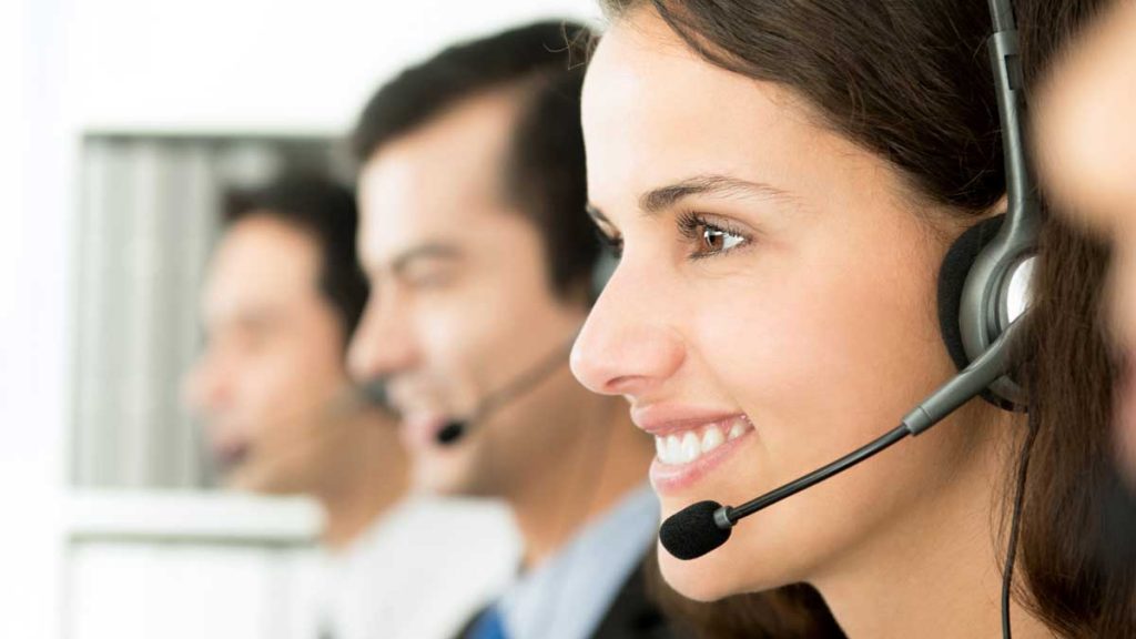 A beautiful picture of employees attending telemarketing in a call center.